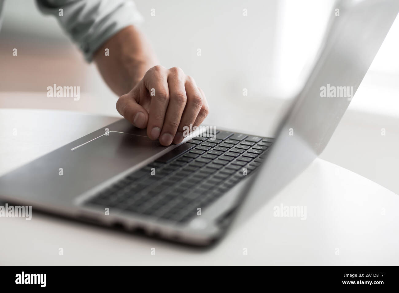 Man uses laptop typing home hi-res stock photography and images - Alamy