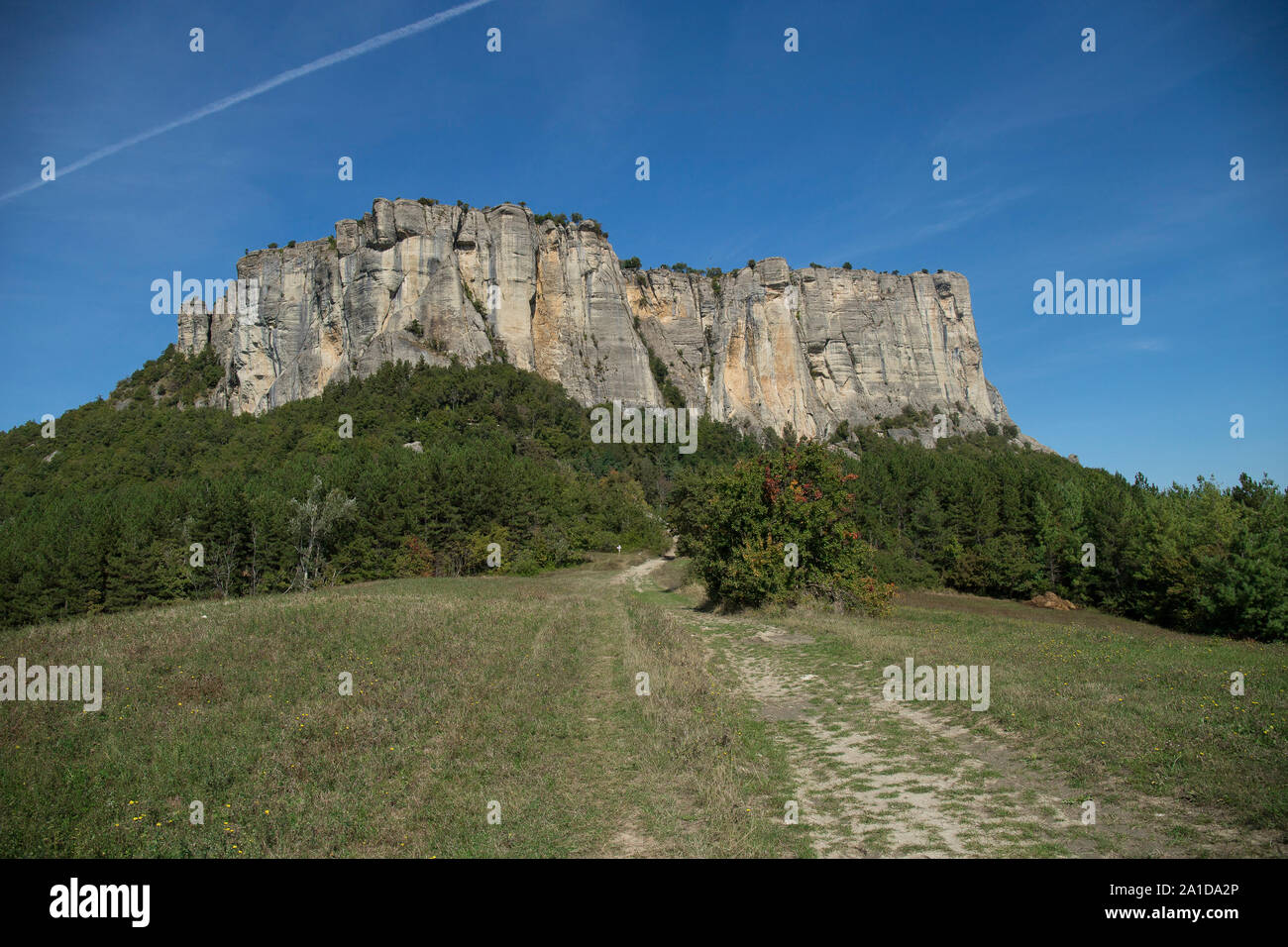 The stone of Bismantova, an isolated impressive spur in the italian appenines region. View from the surrounding fields. Stock Photo