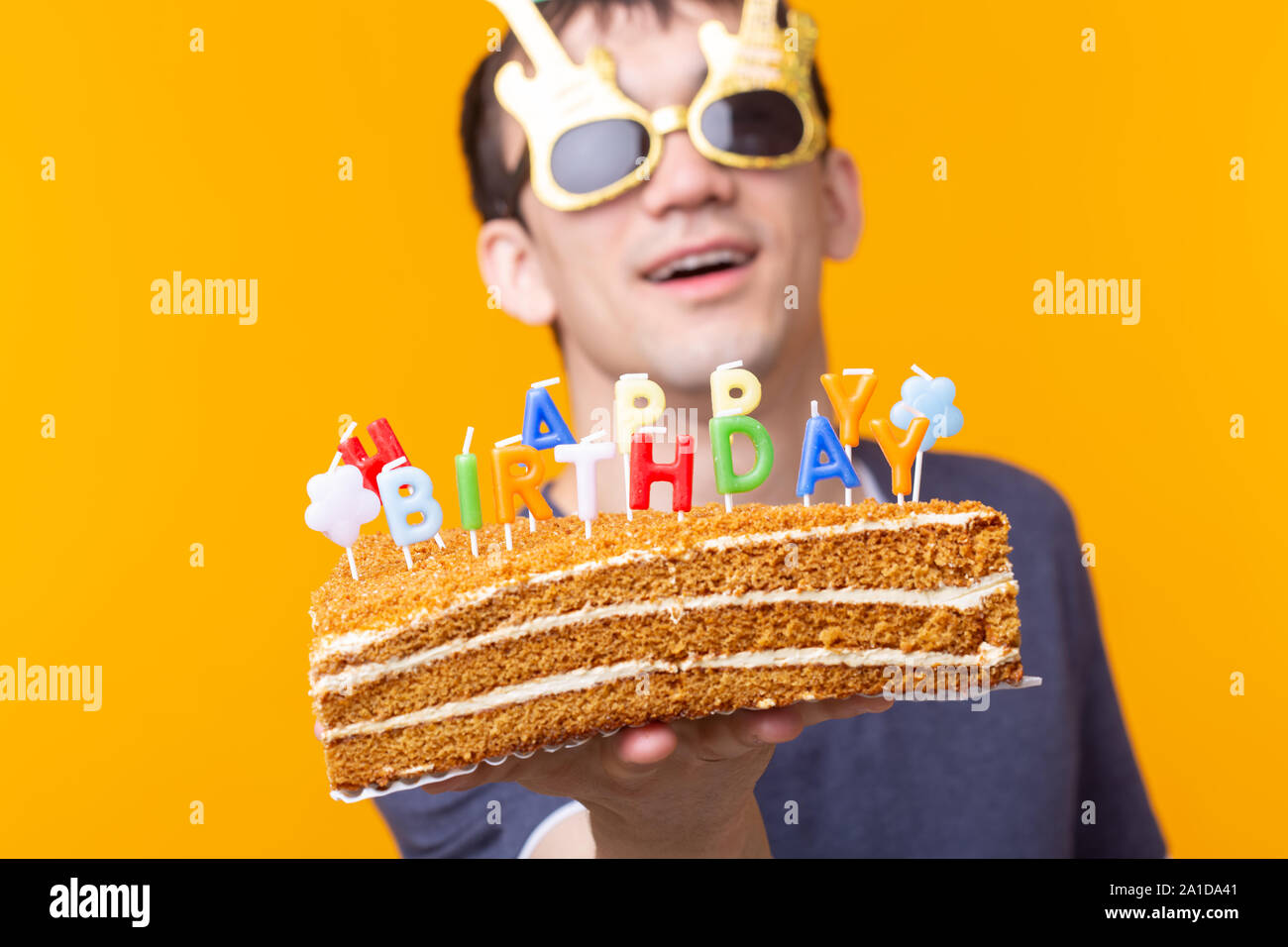 Funny Positive Guy In Glasses Holds In His Hands A Cake With The
