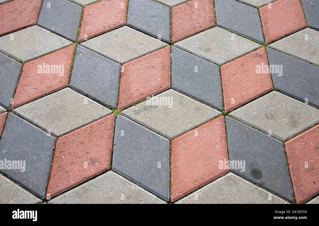 Ground tiles forms decorative pattern pavement Stock Photo