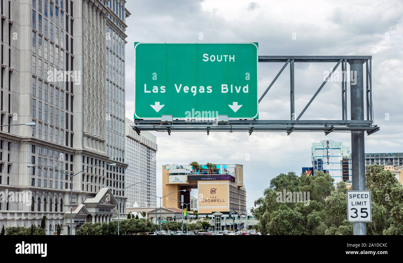 Las Vegas, Nevada USA. May 27, 2019: Las Vegas Blvd road sign green color billboard over the road in the city center, cloudy sky Stock Photo