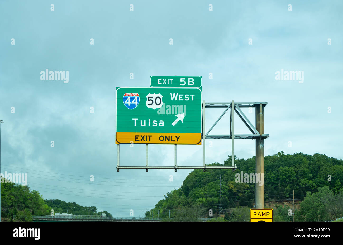 Oklahoma highway, USA. May 29, 2019 Exit to Tulsa road sign green