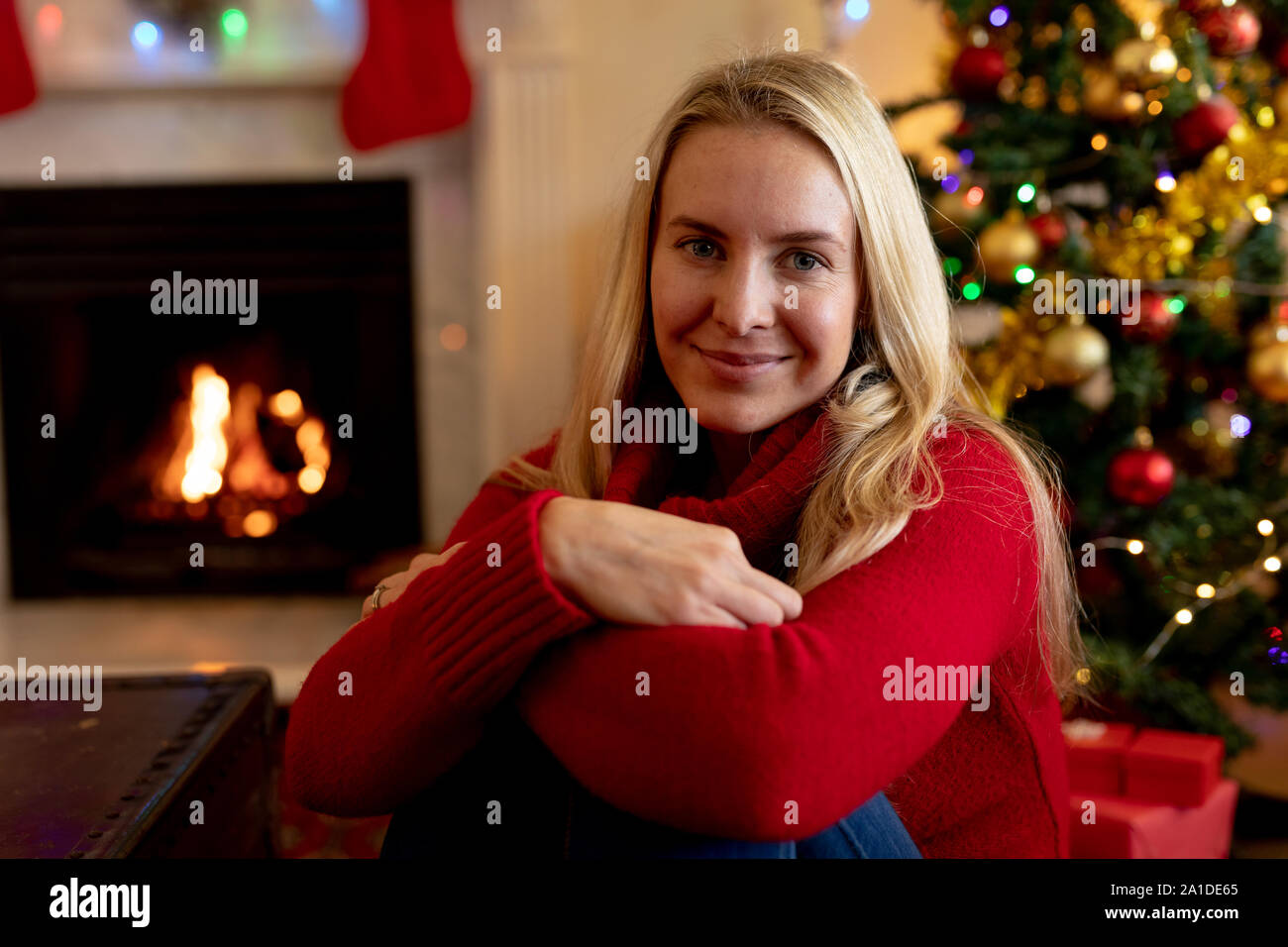 Woman at home at Christmas time Stock Photo