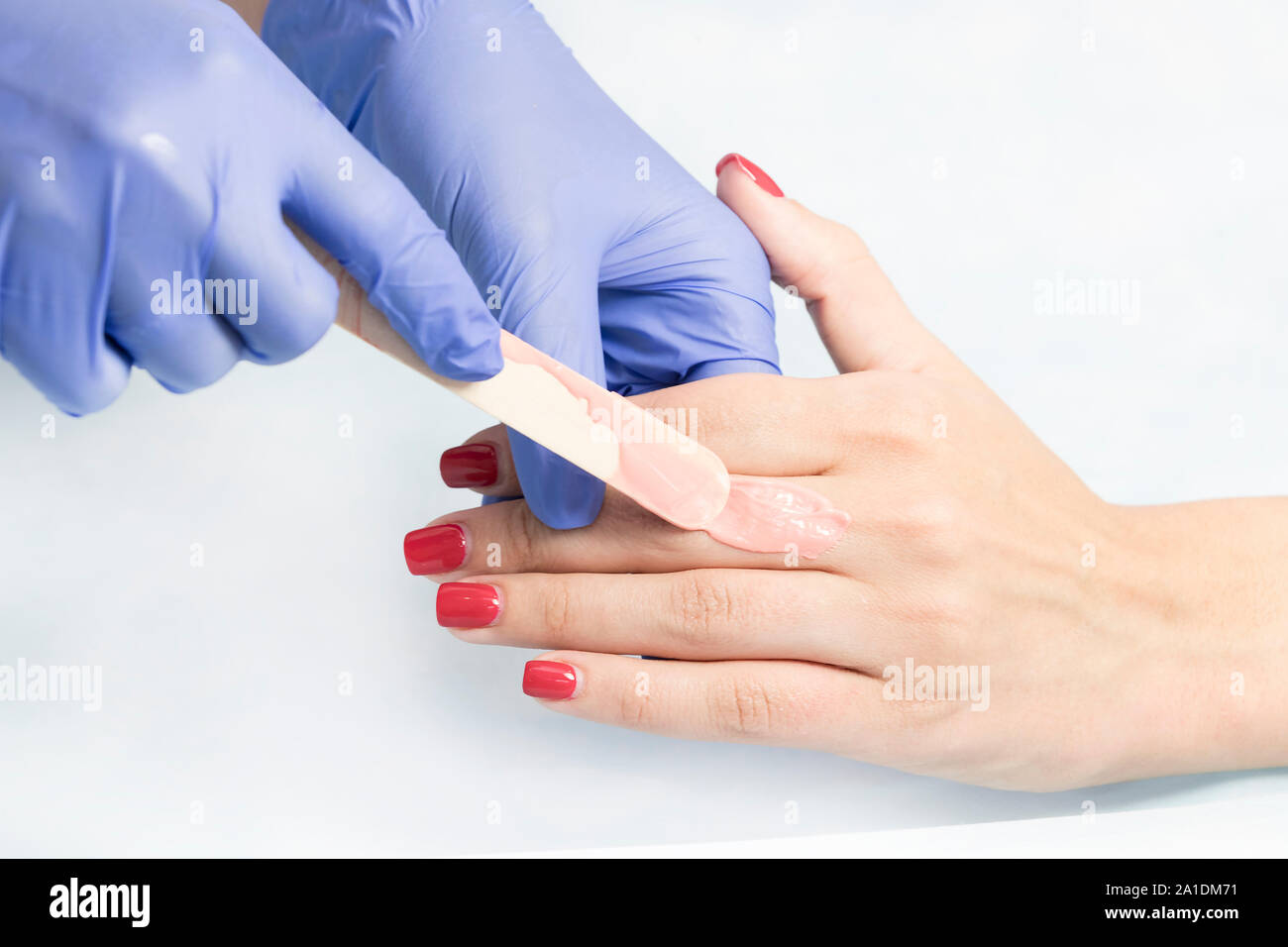 Closeup depilation process of female body parts in a beauty salon Stock ...