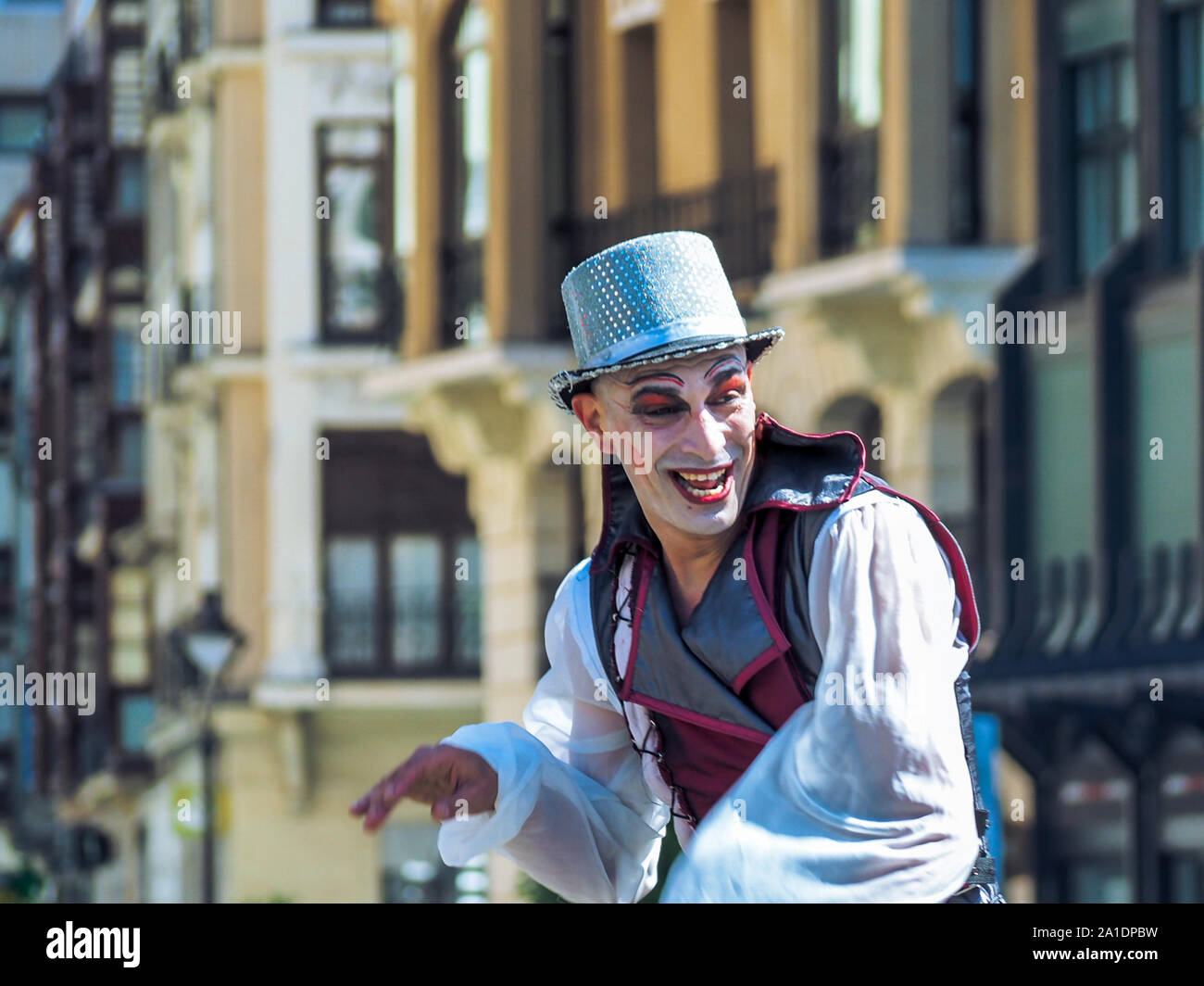 Portrait of artist on stilts during the XV Intercultural Week Parade in Valladolid Stock Photo