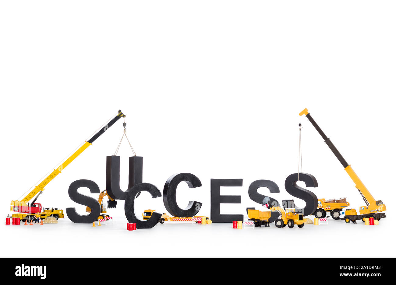 Build up success Machines building successword Stock Photo Alamy