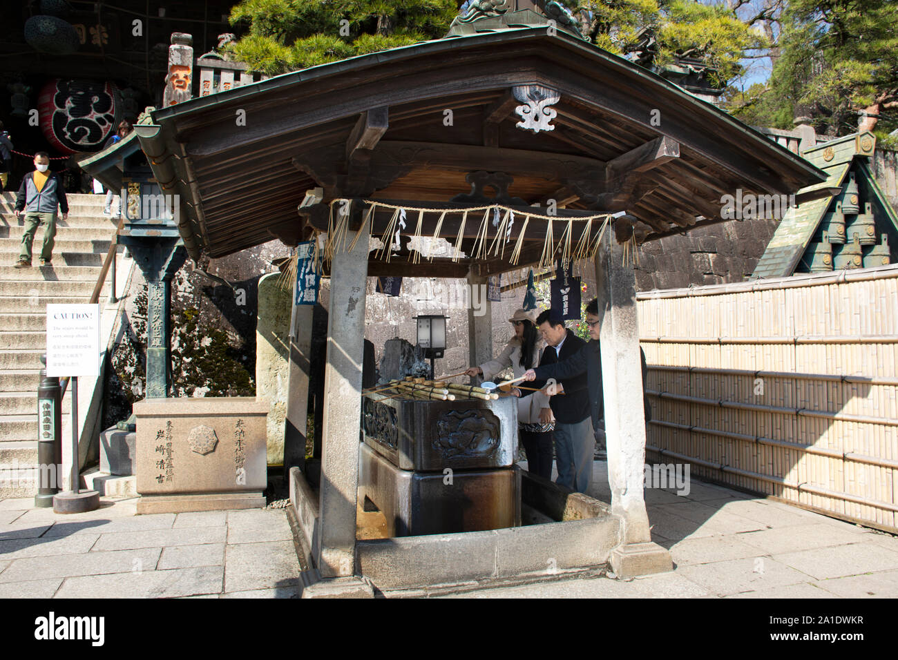 People washing hand rite or Mitarashi ritual with Chozusha or Holy ...