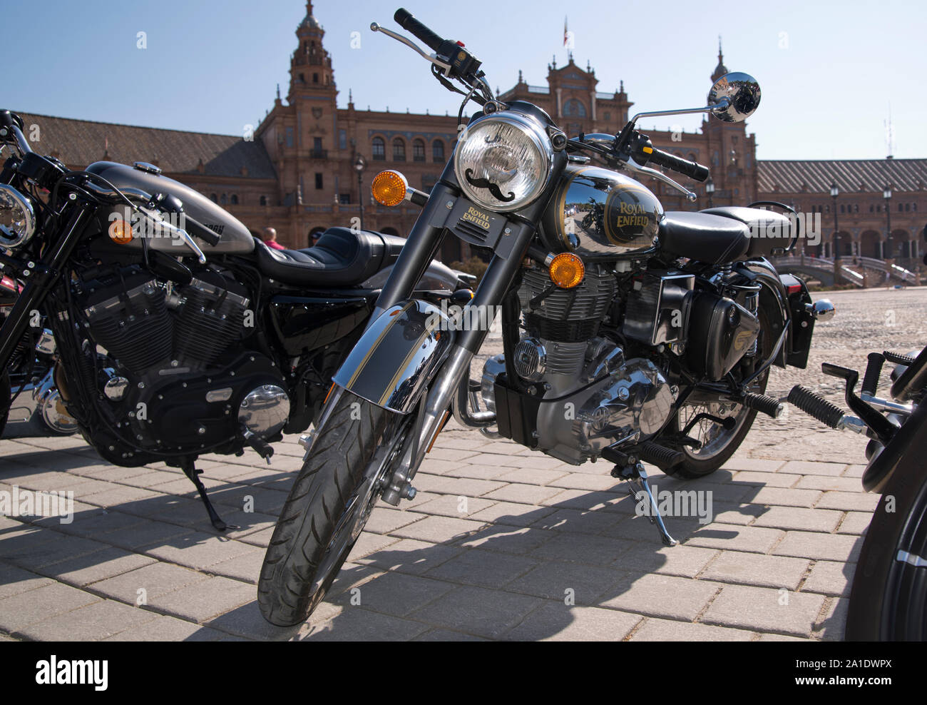 Seville, Andalusia, Spain - Motorcycles lined up at the Plaza de España for the Distinguished Gentleman's Ride. Stock Photo