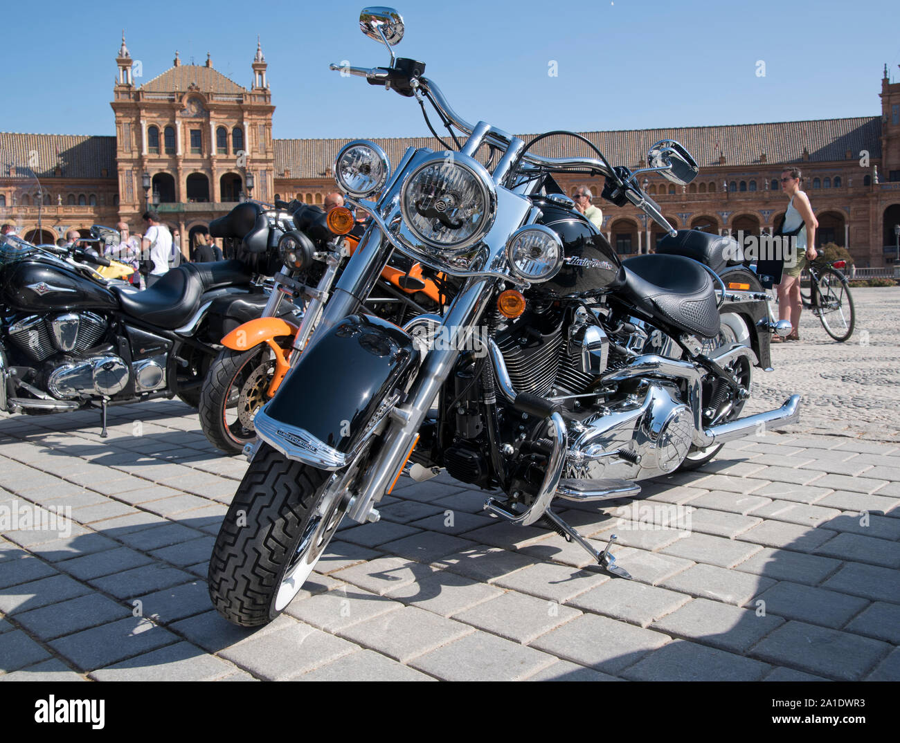 Seville, Andalusia, Spain - Motorcycles lined up at the Plaza de España for the Distinguished Gentleman's Ride. Stock Photo