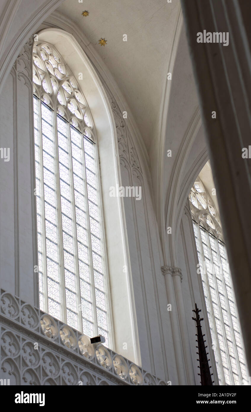 Typical arched, white window as seen in the Cathedral of Our Lady, Antwerp, Flanders, Belgium. Stock Photo