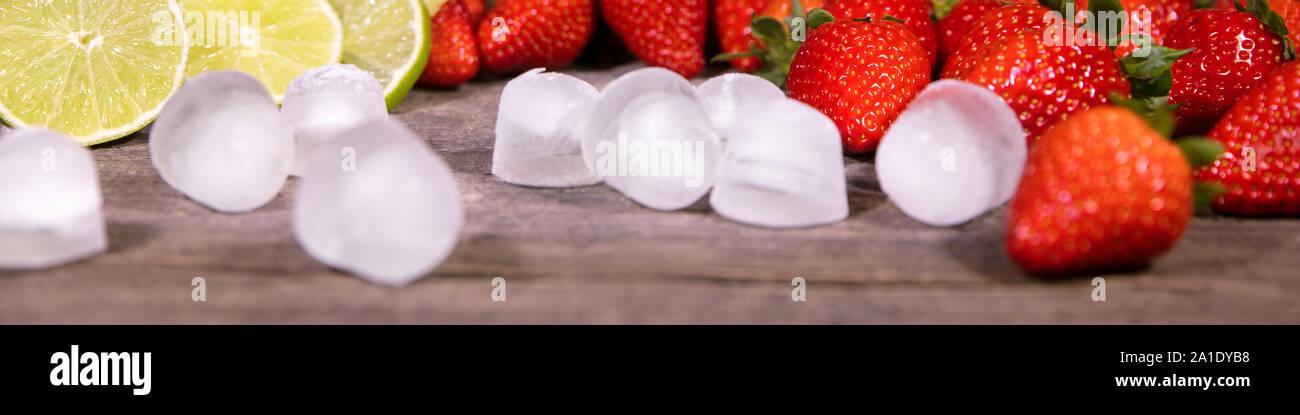 Panorama, Strawberries, lemons and icecubes, lots of Vitamins for the summer Stock Photo
