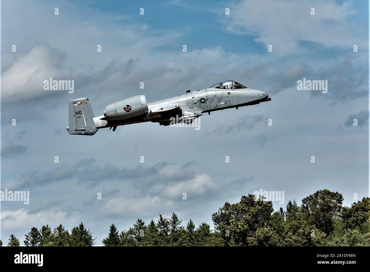 An A-10 Thunderbolt with the 104th Fighter Squadron of the Maryland Air National Guard at Baltimore practices landing approaches Sept. 10, 2019, at Young Air Assault Strip on South Post at Fort McCoy, Wis. The A-10 training was another unique type of training that has taken place at the airstrip in 2019. Wisconsin Guard members assisted with the training. (U.S. Army Photo by Russell Gamache, Fort McCoy Multimedia-Visual Information Office.) Stock Photo