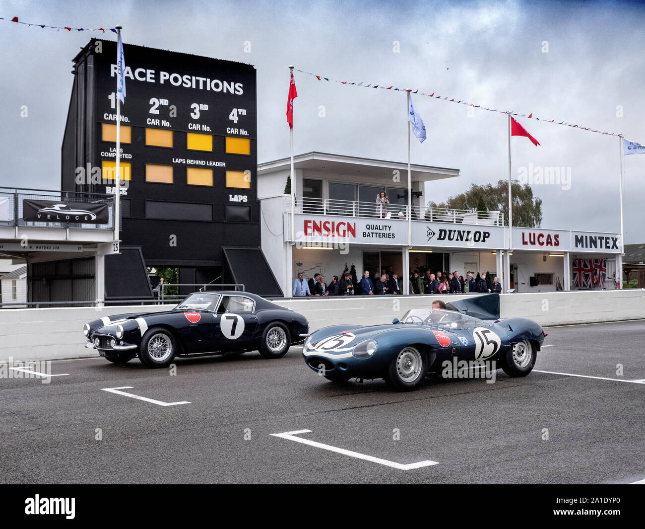 Ferrari 250 SWB Competizione and Jaguar Dtype on the grid at the Veloce Charity Track day at Goodwood 25/9/19 Stock Photo