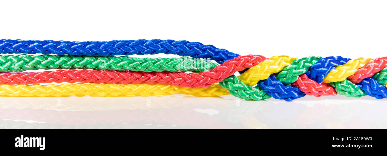 Panorama, colorful ropes are connected, concept cooperation and cohesion Stock Photo