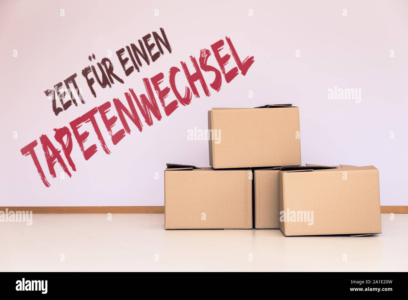 concept move or relocation with boxes in a pink room and german words