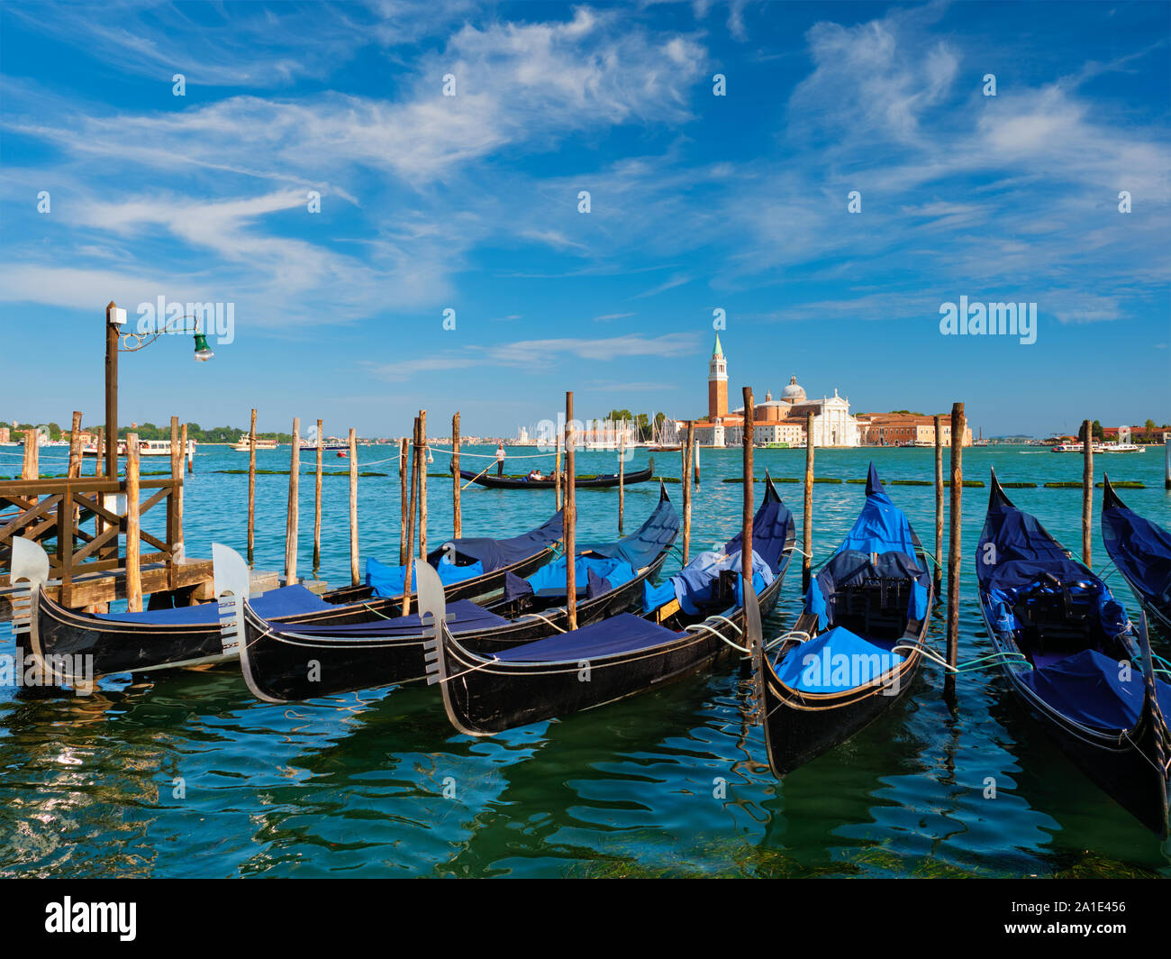 Gondolas and in lagoon of Venice by Saint Mark San Marco square Stock Photo