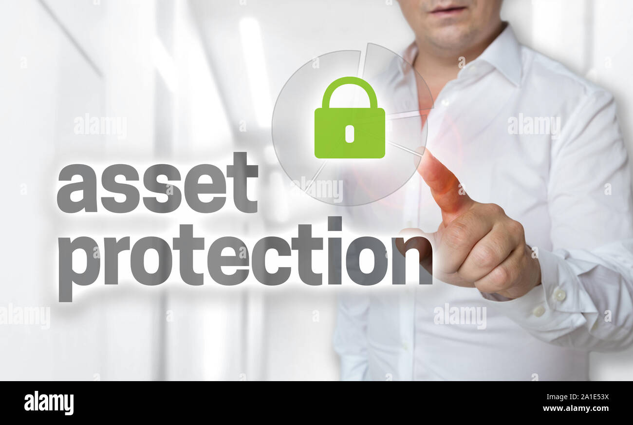 Asset protection concept is operated by man. Stock Photo