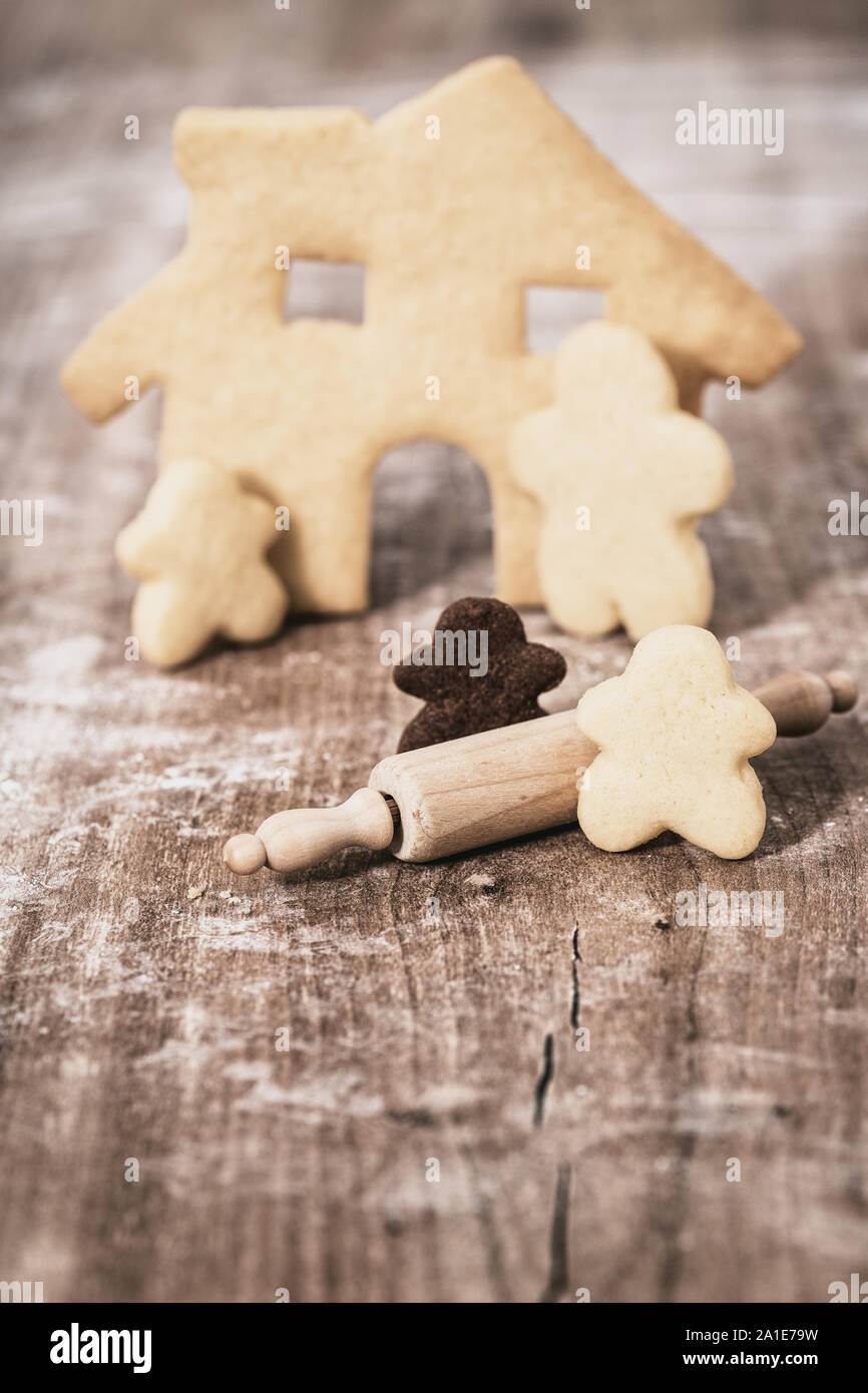 Concept, Family and Homestead bakery, House, Parents and children and adoption, wooden background Stock Photo