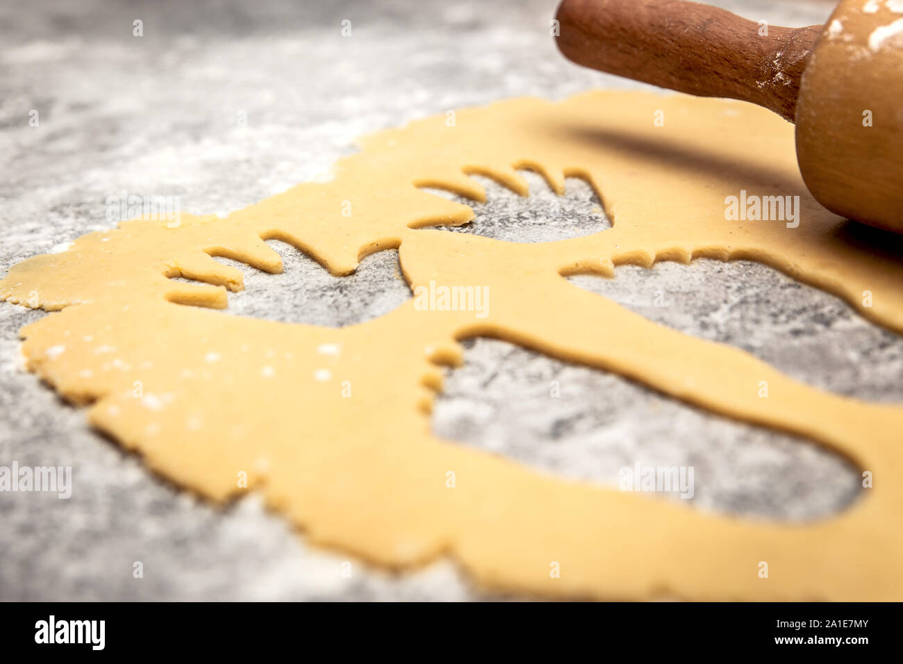 Raw cookie dough with hands and feet cutout, concept family and baby is born Stock Photo