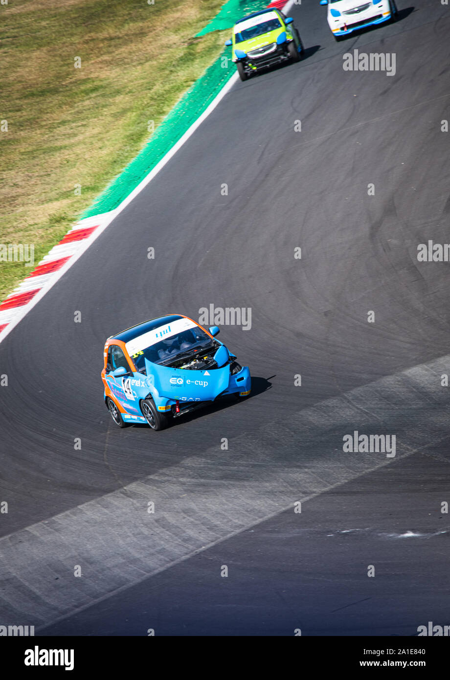 Vallelunga, Italy september 14 2019. High angle view of asphalt circuit with Smart electric engine racing car in action during the race, crashed damag Stock Photo