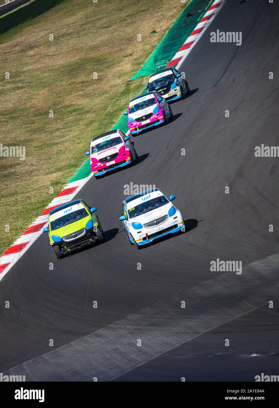 Vallelunga, Italy september 14 2019. High angle view of asphalt circuit with Smart electric engine racing car in action during the race, overtaking at Stock Photo