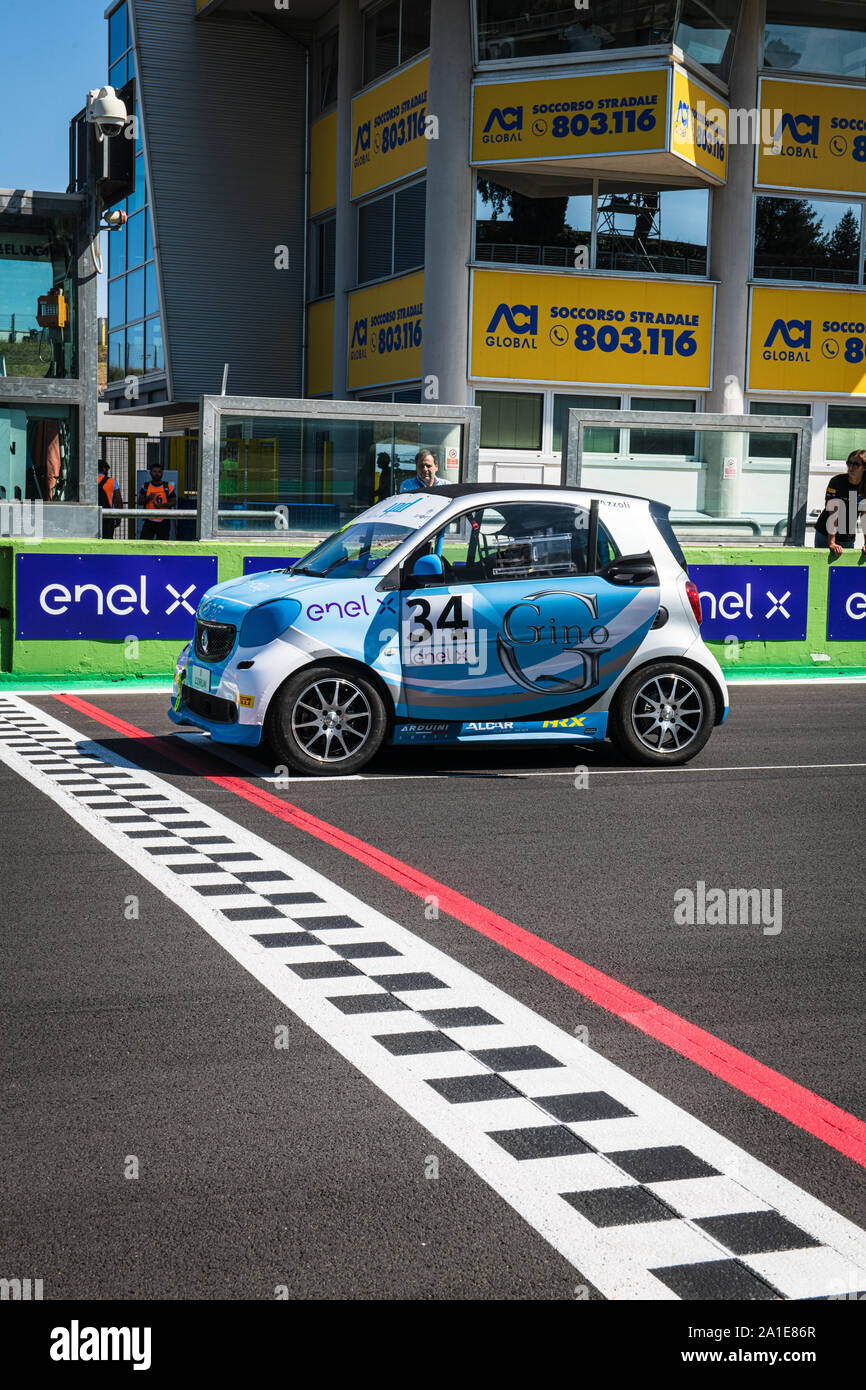 Vallelunga, Italy september 14 2019. Side view of racing Smart fortwo electric engine car in first position on grid asphalt track circuit Stock Photo
