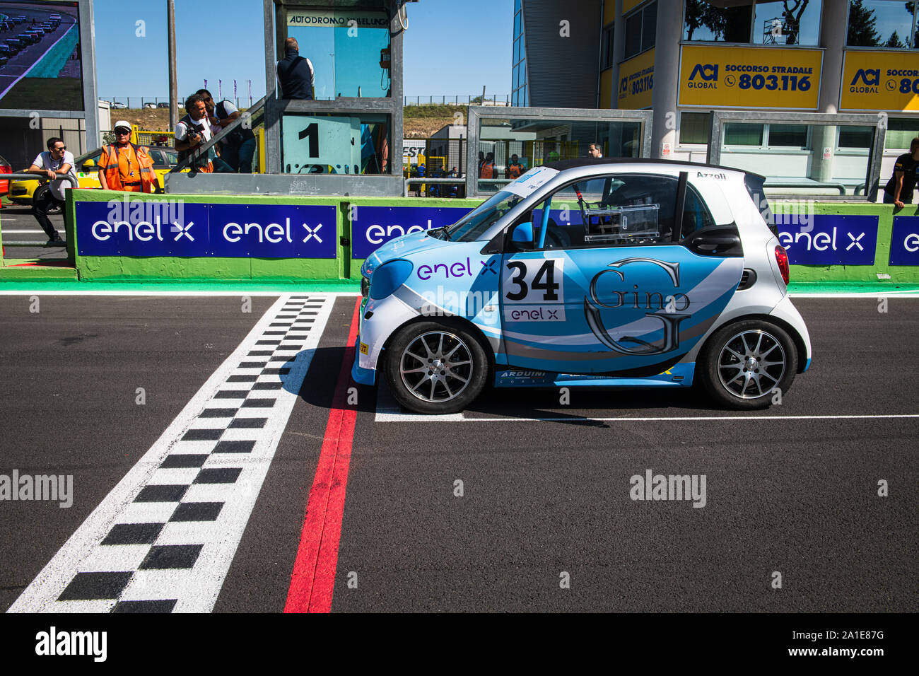 Vallelunga, Italy september 14 2019. Side view of racing Smart fortwo electric engine car in first position on grid asphalt track circuit Stock Photo