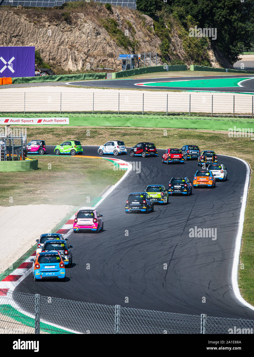 Vallelunga, Italy september 14 2019. High angle view of asphalt circuit with Smart electric engine racing car in action during the race rear view Stock Photo