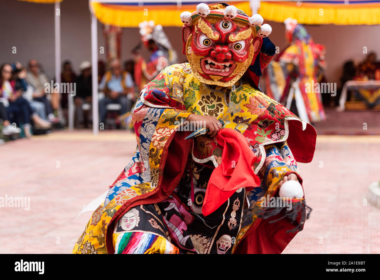 Monk performing a ritual dance in Takthok monastery, Ladakh Stock Photo ...