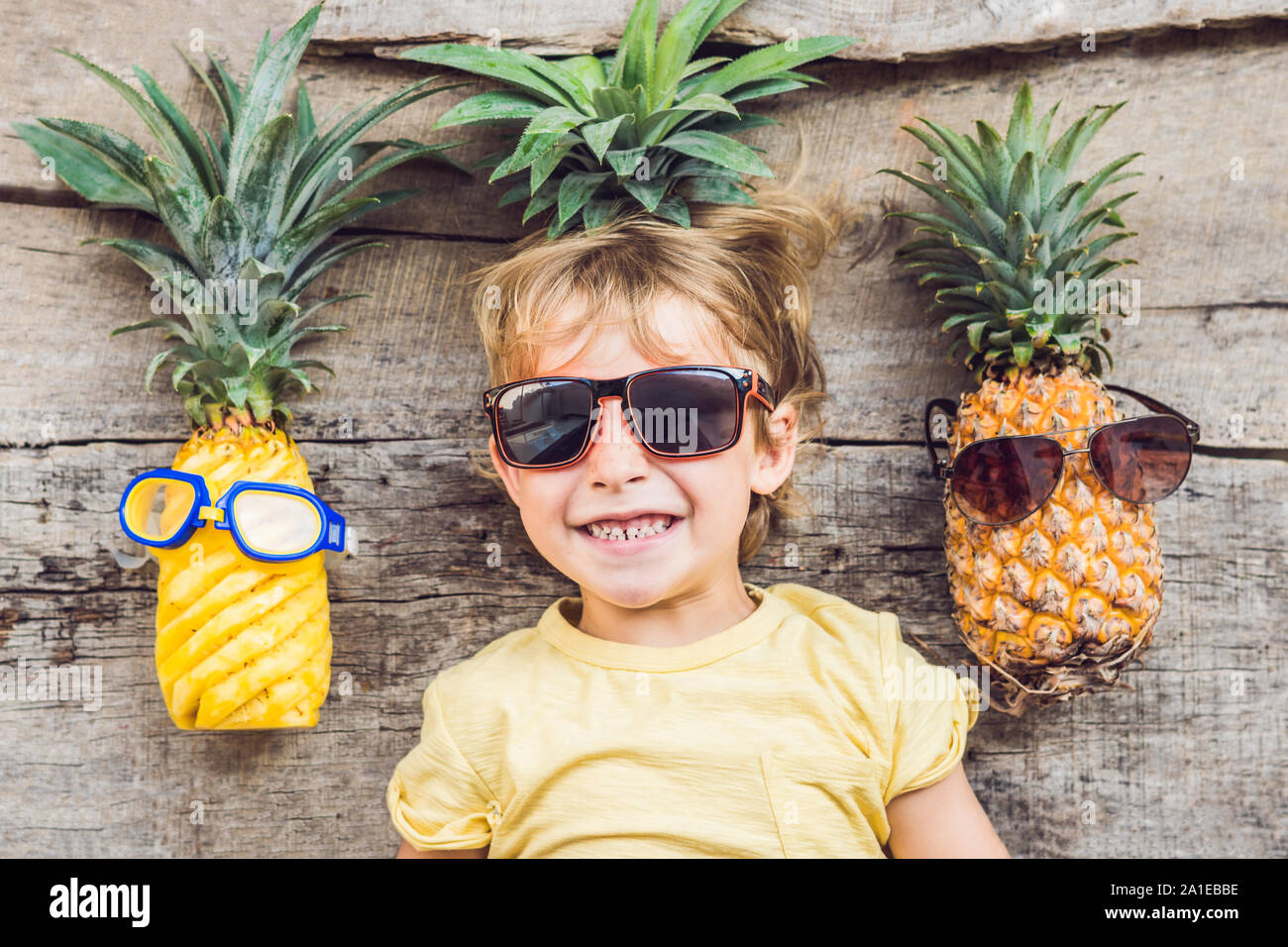 A pineapple boy and pineapples on vacation. Stock Photo