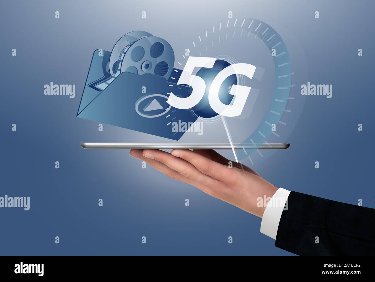 Man holding a digital tablet with symbol of 5G network connection. Stock Photo