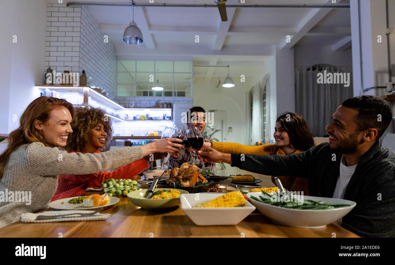 Friend Raising Event Friends raising toast drinking wine hi-res stock photography and images ...