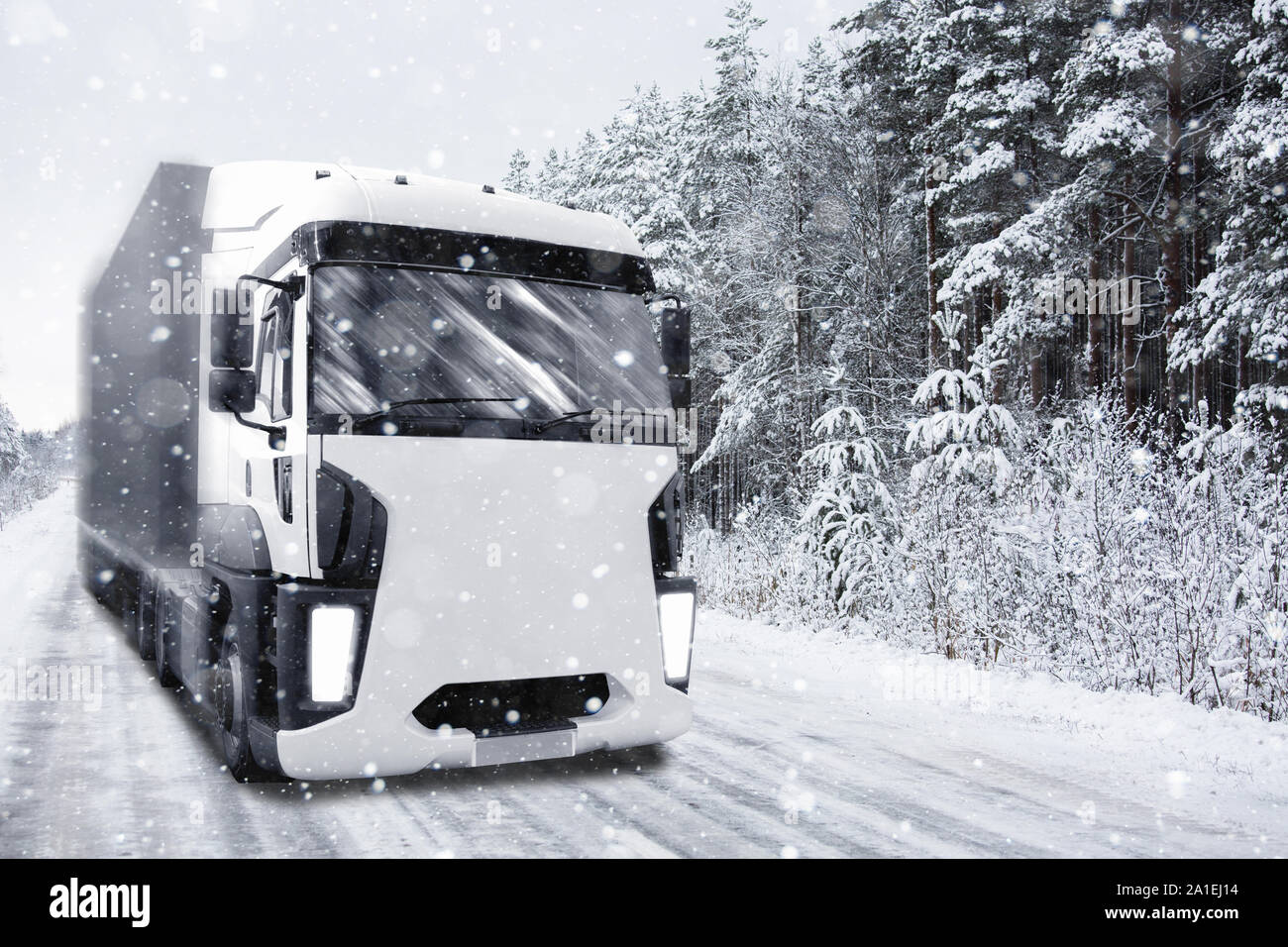 Truck rides on winter road in snowfall Stock Photo