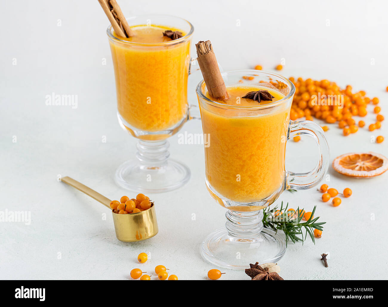 Banner with hot beverages as sea buckthorn on white background. Concept of hot drinks with ingredients Stock Photo
