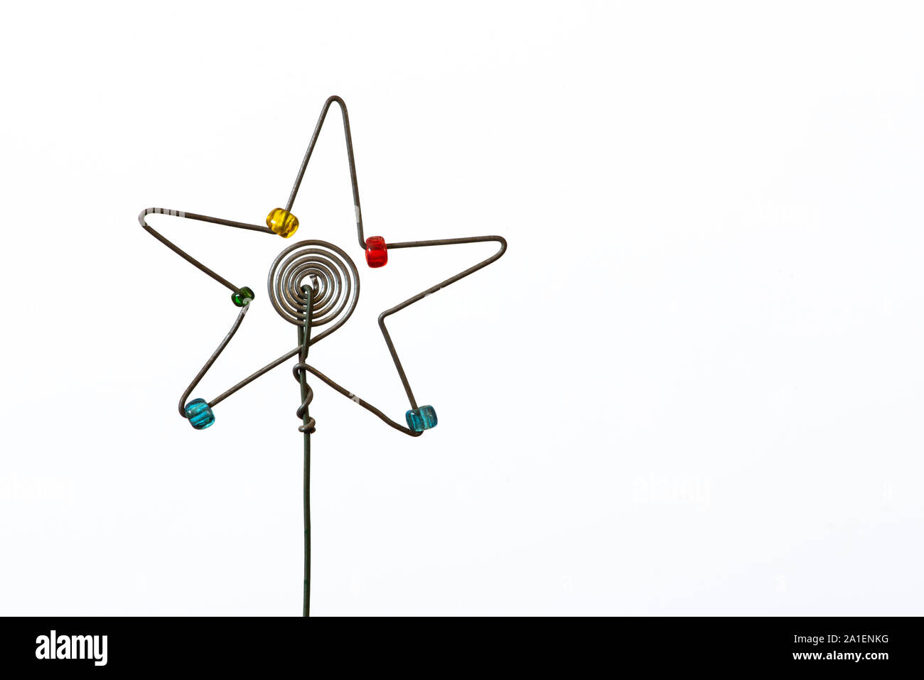 An iconic but simple Christmas star created out of wire and beads. Stock Photo