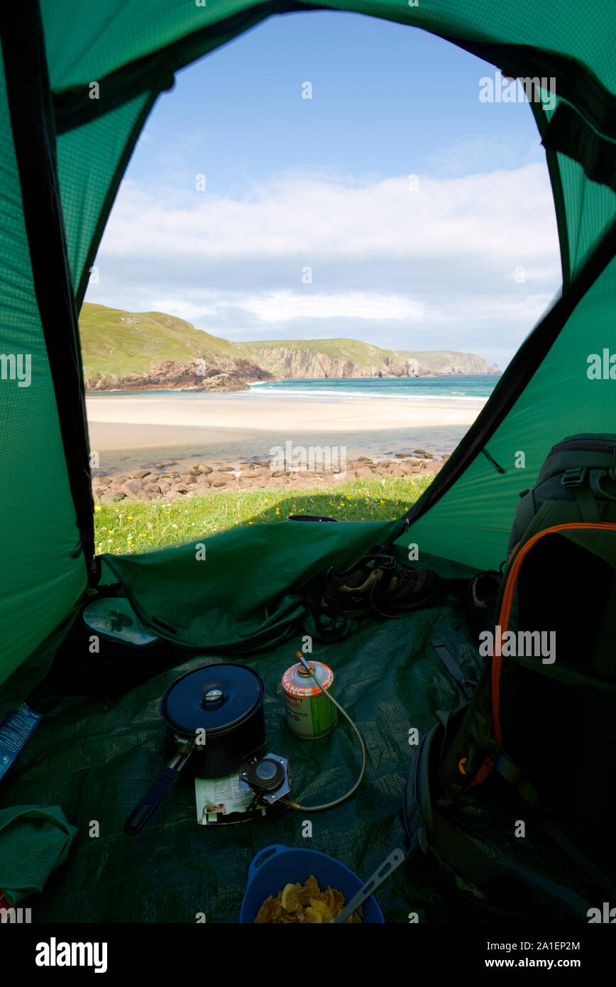 View from inside tent at Kearvaig Bay, Sutherland Stock Photo