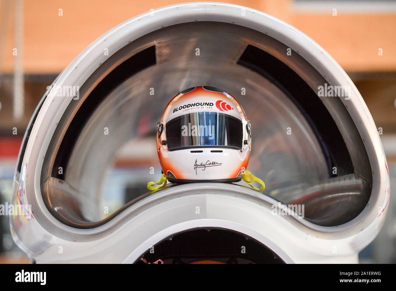 Ex fighter pilot Andy Green's freshly painted crash helmet sits inside the air intake on Bloodhound as it enters the final build phase at Gloucestershire Science and Technology Park, Berkeley, before it heads off to South Africa for testing ahead of a land speed record attempt. Stock Photo
