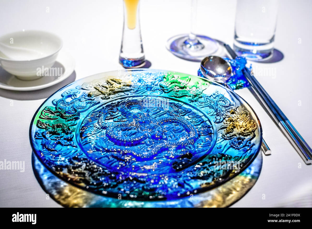 beautiful tableware and cutlery in a elegant dining table setting in a ...