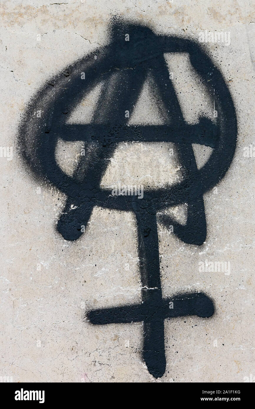 Feminist anarchists logo painted on a wall, Lyon, France Stock Photo
