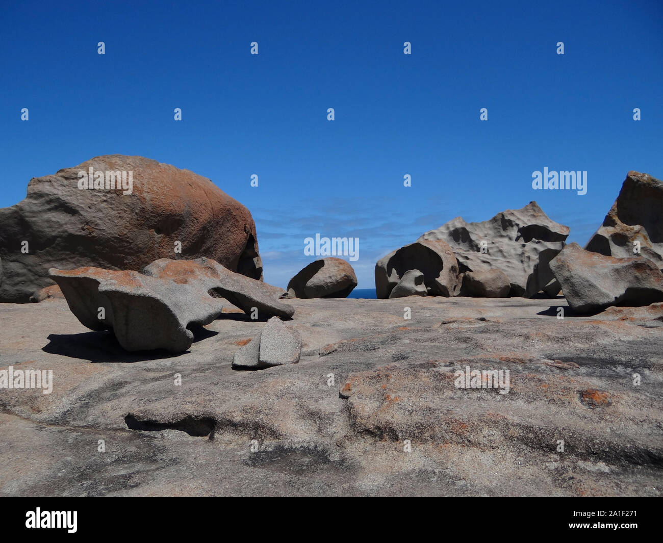 A formation of remarkable rocks with blue sky and the sea in the ...