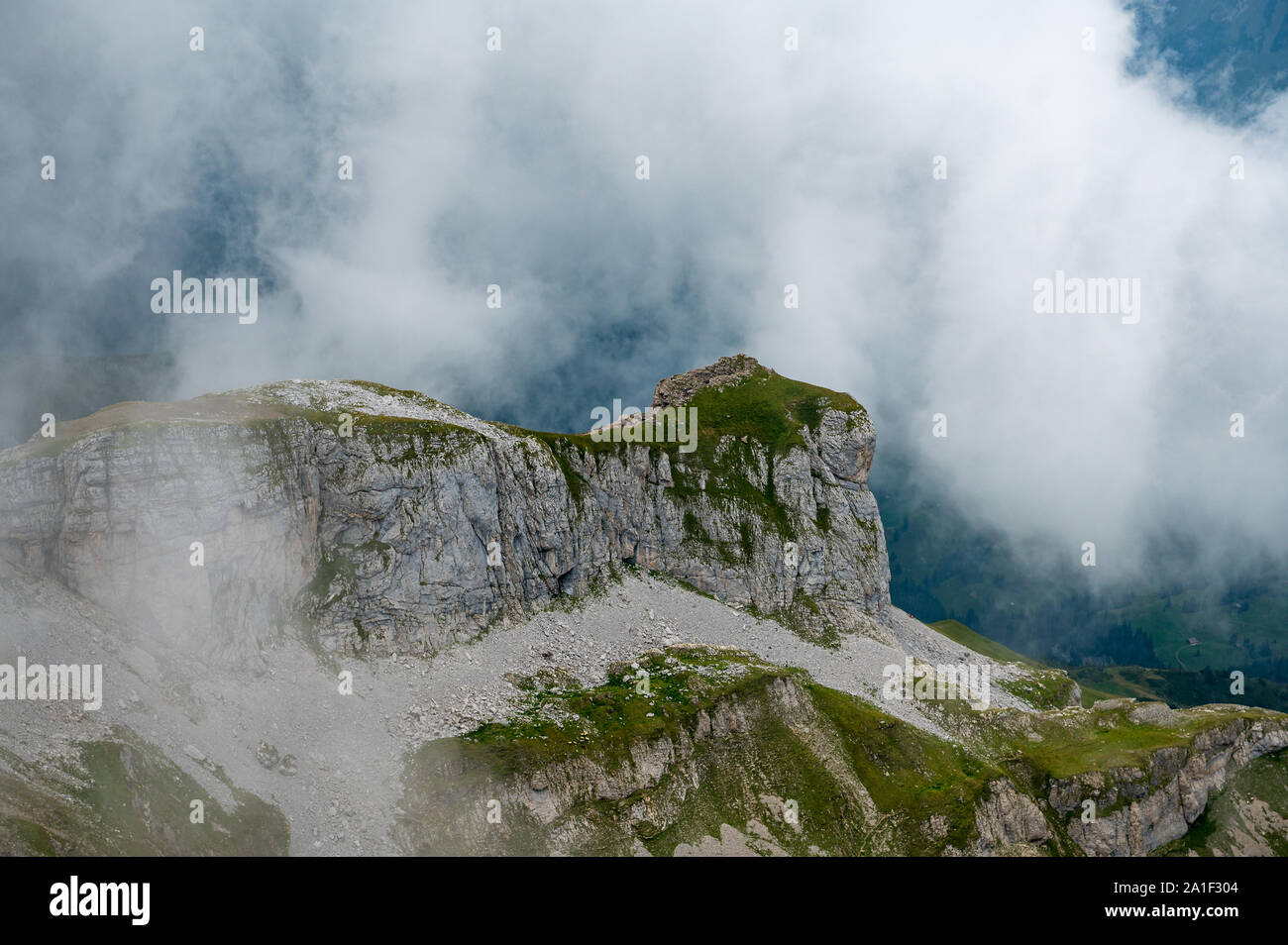 landscape of Kiental in misty clouds while hiking Stock Photo