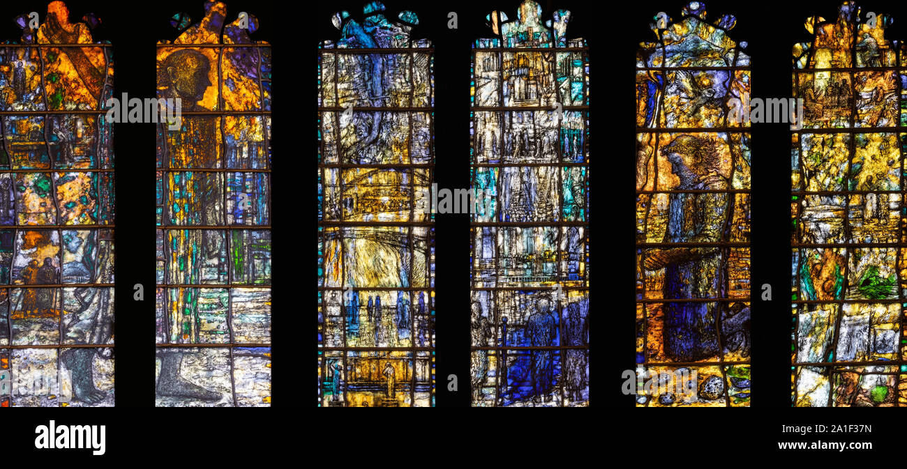 A triptych that includes the three windows by Thomas Denny, 2006, in the Bede Chapel of Sunderland Minster, Sunderland, Tyne and Wear, UK Stock Photo