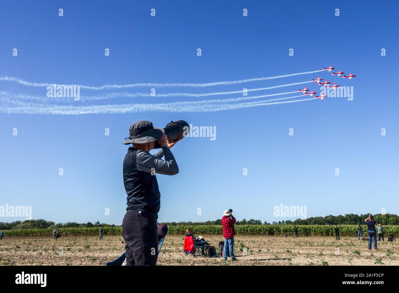 Plane spotter airshow photographer taking photos Stock Photo