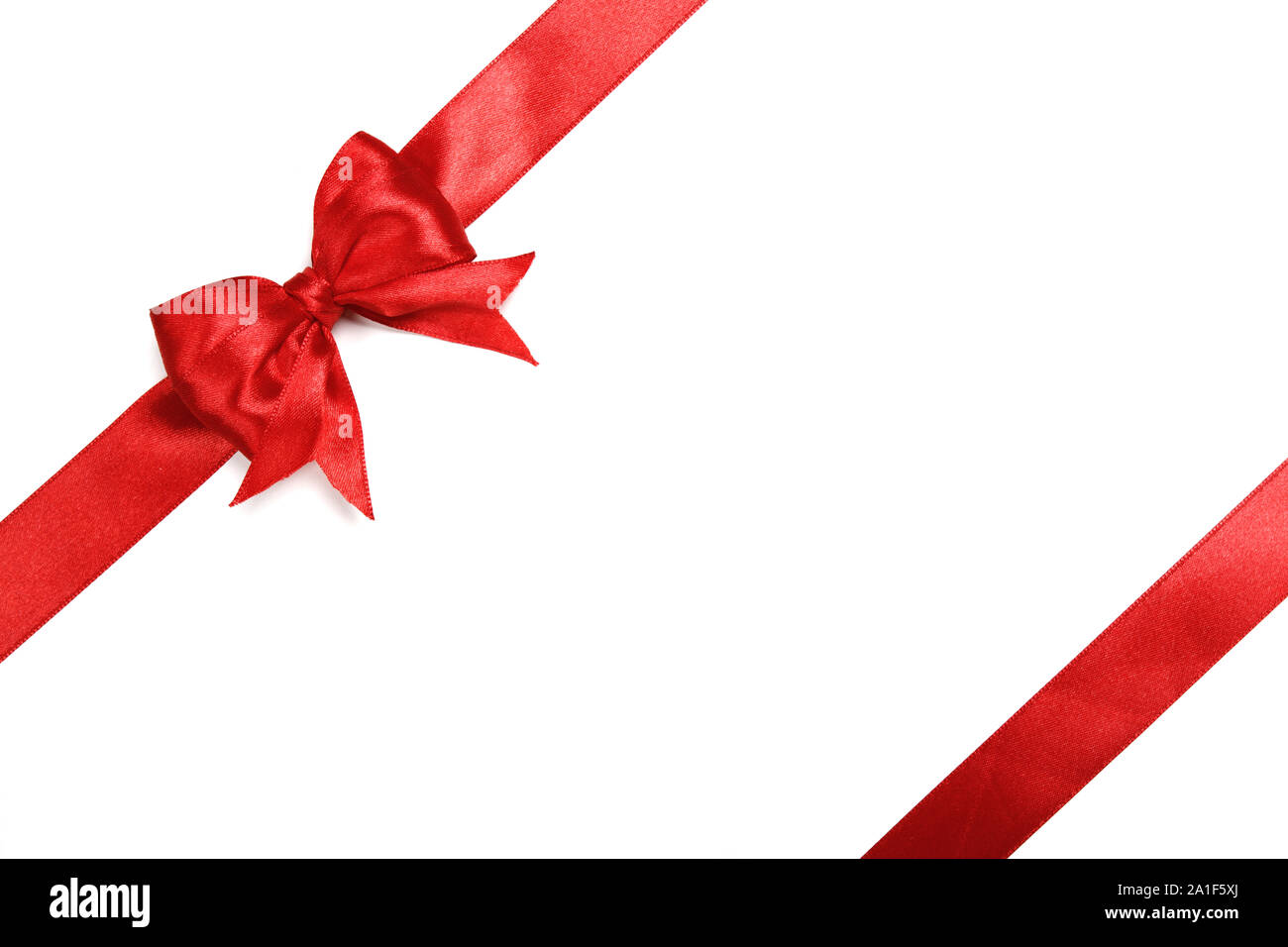 Red ribbon bow on isolated white background Stock Photo - Alamy