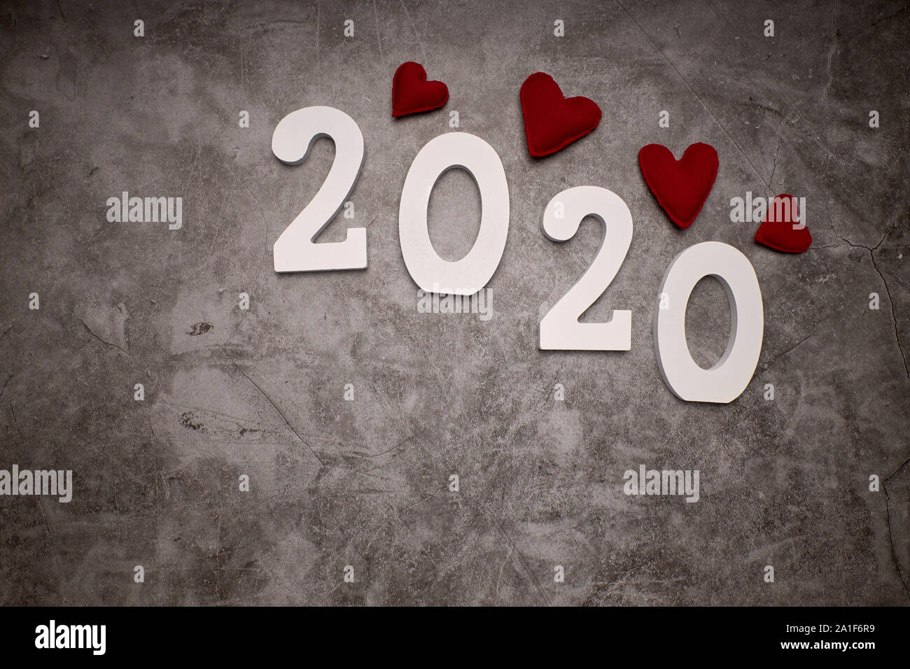 Happy New Year 2020. Symbol from number 2020 and hearts on gray ...