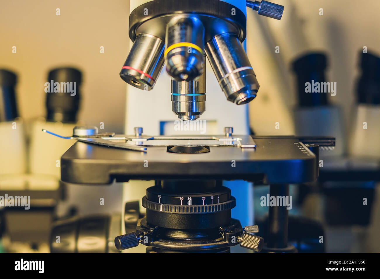 Optical microscope with four different objective lenses Stock Photo Alamy