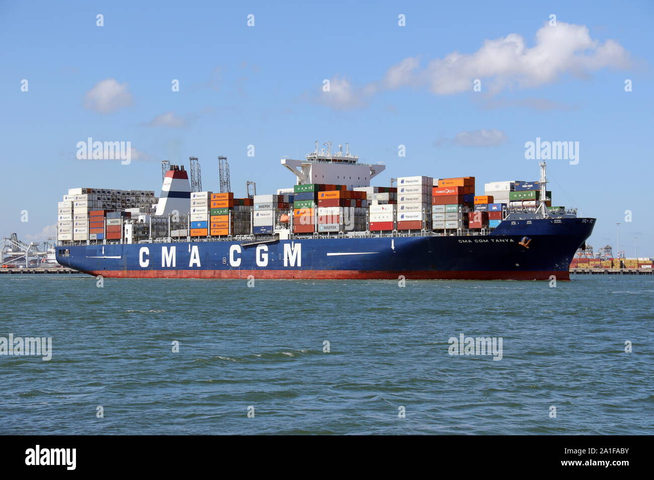 The container ship CMA CGM Tanya is leaving the port of Rotterdam on 3 July 2019. Stock Photo