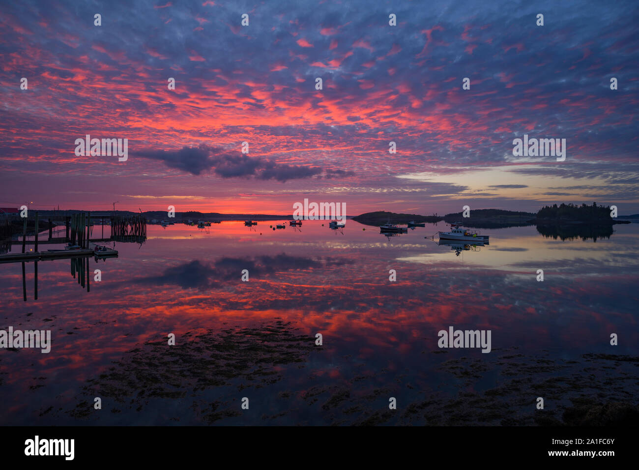 Last night's amazing sunset in Lubec, Maine.  Nikon Z 7, NIKKOR Z 14-30mm f/4 S lens @ 18mm, f/8, ISO 64, 1/5 second. Stock Photo