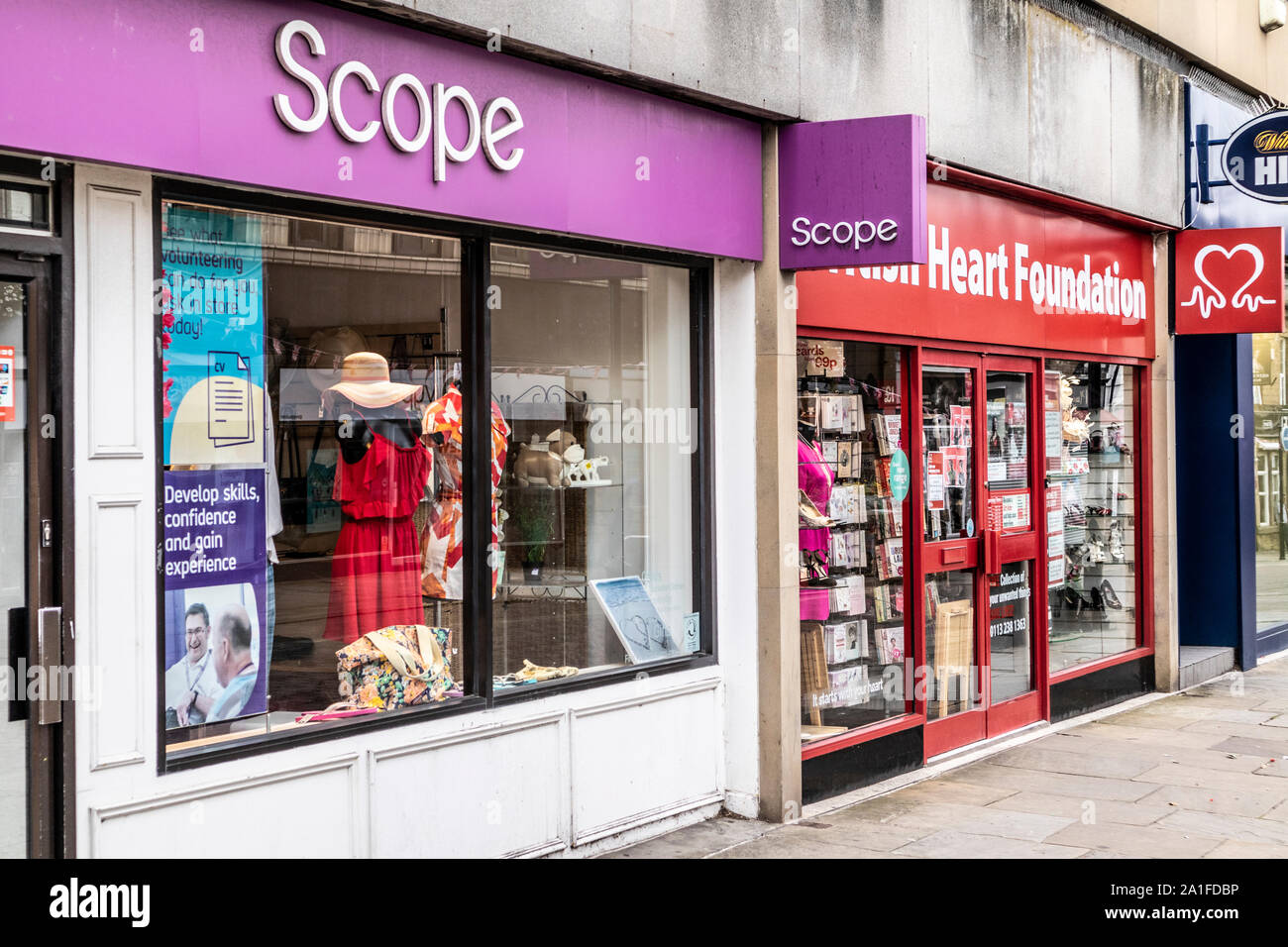 The Scope & British Heart Foundation charity shops in Morley, Leeds, West Yorkshire UK Stock Photo