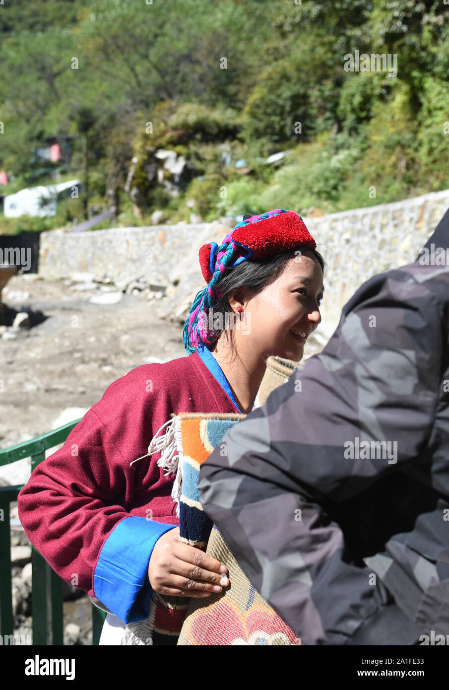 Shannan, China's Tibet Autonomous Region. 26th Sep, 2019. A villager of the Monba ethnic group moves to new dwelling in Cona County, Shannan City, southwest China's Tibet Autonomous Region, Sept. 26, 2019. Villagers of the Monba ethnic group moved to their new dwellings to improve housing conditions. Credit: Jigme Dorje/Xinhua/Alamy Live News Stock Photo